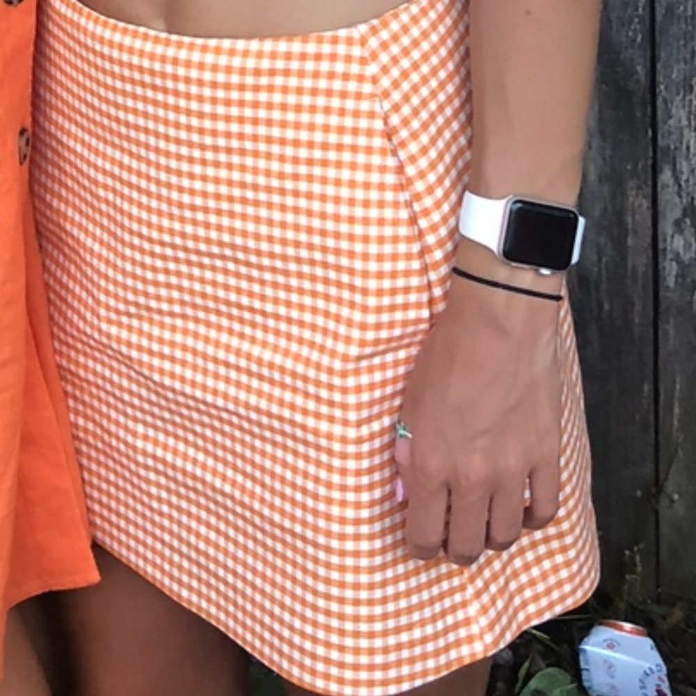 Urban Outfitters orange and white checkered mini skirt size XS